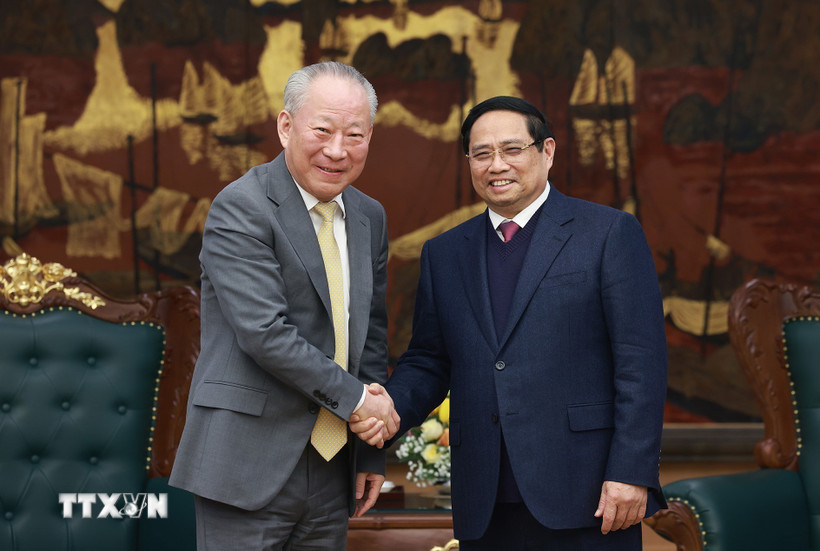Thủ tướng Phạm Minh Chính tiếp ông Nghiêm Giới Hòa, người sáng lập Tập đoàn xây dựng Thái Bình Dương (Trung Quốc). (Ảnh: Dương Giang/TTXVN)