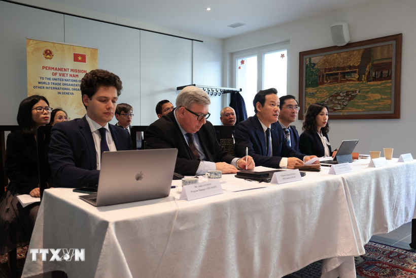 Các đại biểu tham dự hội thảo tại Phái đoàn thường trực Việt Nam tại Geneva. (Ảnh: Ngọc Ánh/TTXVN)
