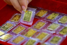 Giá vàng trong nước tăng thêm 1 triệu đồng so với phiên sáng. (Ảnh: Vietnam+)