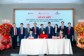 Tập đoàn Amaccao ký kết với Agribank chi nhánh Bắc Yên Bái và Agribank chi nhánh Nam Đà Nẵng. (Ảnh: Vietnam+)