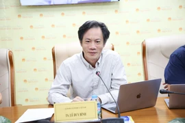 Tiến sĩ Lê Duy Bình - Giám đốc Economica Việt Nam phát biểu tại tọa đàm "Tạo lập khuôn khổ pháp lý đồng bộ về xử lý nợ xấu". (Ảnh: Vietnam+)