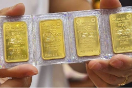 Vàng miếng SJC. (Ảnh: Vietnam+)