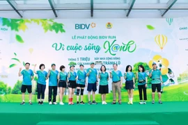 Ban Tổ chức phát động chương trình “BIDV RUN - Vì cuộc sống Xanh” năm 2025 tại Trụ sở chính BIDV. (Ảnh: Vietnam+)
