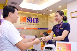 SHB dự kiến tiếp tục duy trì tỷ lệ cổ tức 18% trong năm 2025 khẳng định tiềm lực tài chính vững mạnh và cam kết dài hạn với cổ đông. (Ảnh: Vietnam+)