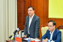 Ông Đào Xuân Tuấn, Cục Trưởng Cục quản lý ngoại hối, Ngân hàng Nhà nước thông tin về quản lý thị trường vàng. (Ảnh: Vietnam+)