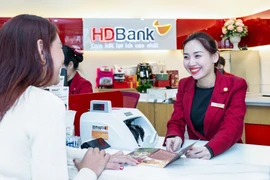 HDBank chốt quyền chia gần 30% cổ tức và cổ phiếu thưởng. (Ảnh: Vietnam+)