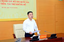 Phó Thống đốc Ngân hàng Nhà nước Nguyễn Ngọc Cảnh phát biểu tại Hội thảo. (Ảnh: Vietnam+)