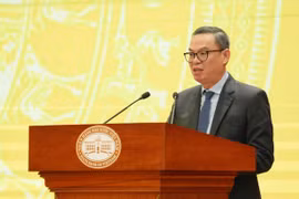 Ông Trần Minh Bình, Chủ tịch Hội đồng quản trị Ngân hàng Thương mại cổ phần Công thương Việt Nam phát biểu tại hội nghị. (Ảnh: Vietnam+)