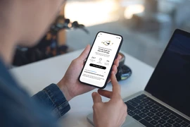 Ra mắt chương trình “Sinh lời rinh lộc” trên Techcombank Mobile dịp Tết 2026. (Ảnh: Vietnam+)