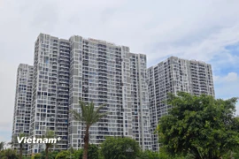 Nhiều người có nhu cầu mua nhà nhưng vẫn chưa thể có cơ hội do nhiều địa phương chưa quan tâm chỉ đạo. (Ảnh: Vietnam+)