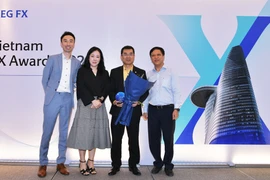 Với những hoạt động tích cực trên thị trường ngoại…aded tại buổi Lễ trao giải Vietnam FX Matching. (Ảnh: Vietnam+)