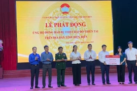 Ngày 5/8/2025, Agribank trao tặng kinh phí 2 tỷ đồng cho Ủy ban Mặt trận Tổ quốc Việt Nam tỉnh Điện Biên ủng hộ đồng bào bị thiệt hại do thiên tai trên địa bàn tỉnh. (Ảnh: Vietnam+)