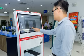 Agribank hợp tác cùng địa phương triển khai Kiosk thông minh và hệ thống số hóa, thúc đẩy phát triển kinh tế xã hội bền vững. (Ảnh: Vietnam+)