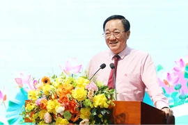 Tổng Giám đốc Ngân hàng Chính sách xã hội Dương Quyết Thắng chỉ đạo hội nghị. (Ảnh: Vietnam+)