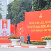 Pano, khẩu hiệu rực đỏ trên các tuyến phố Thủ đô Hà Nội, chào mừng Đại hội đại biểu toàn quốc lần thứ XIV của Đảng. (Ảnh: Lê Đông/TTXVN)