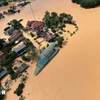 Do mực nước lũ dâng cao, nhiều xã, phường của các tỉnh Thái Nguyên, Bắc Ninh, Cao Bằng, Lạng Sơn sẽ tiếp tục ngập lụt trong những ngày tới. (Ảnh: TTXVN)