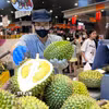 Đảm bảo yêu cầu chất lượng, truy xuất nguồn gốc sầu riêng. (Ảnh: Hương Giang/TTXVN)