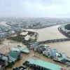 Nhiều khu vực tại phường Quy Nhơn Đông (tỉnh Gia Lai) ngập sâu trong nước. (Ảnh: Quang Thái/TTXVN)