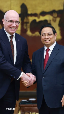 Thủ tướng Phạm Minh Chính tiếp Tổng giám đốc Hãng Thông tấn TASS (Liên bang Nga) Andrey Kondrashov. (Ảnh: Dương Giang/TTXVN)