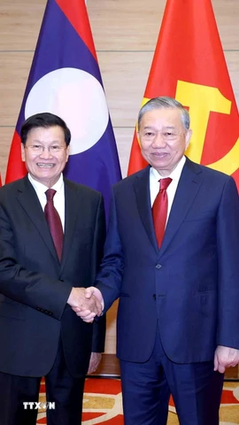 Tổng Bí thư Tô Lâm và Tổng Bí thư, Chủ tịch nước Lào Thongloun Sisoulith. (Ảnh: Phương Hoa/TTXVN)