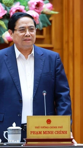 Thủ tướng Phạm Minh Chính làm việc với lãnh đạo Bộ Quốc phòng về phát triển công nghiệp quốc phòng. (Ảnh: Dương Giang/TTXVN)