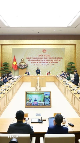 Hội nghị tổng kết “Chiến dịch Quang Trung” xây dựng lại nhà cho các gia đình bị thiệt hại do bão lũ tại miền Trung. (Ảnh: Dương Giang/TTXVN)