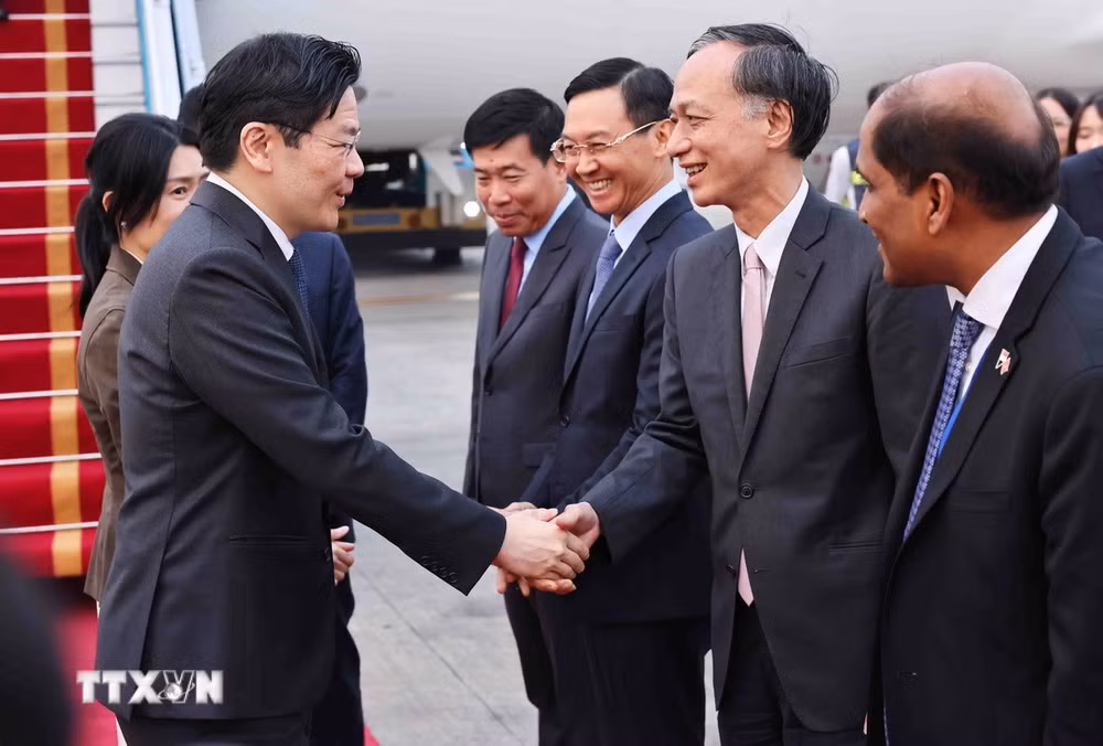ttxvn-thu-tuong-singapore-den-viet-nam-3.jpg