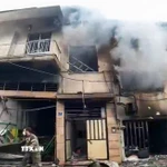 Khói bốc lên từ tòa nhà tại Tehran, Iran sau cuộc tấn công do lực lượng Mỹ-Israel tiến hành ngày 11/3. (Ảnh: ANI/TTXVN)