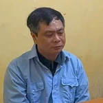 Bị can Phạm Văn Long, Hiệu trưởng trường Cao đẳng Du lịch Hà Nội. (Ảnh: Công an cung cấp)