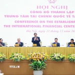 Thủ tướng Phạm Minh Chính chủ trì Hội nghị công bố thành lập Trung tâm Tài chính quốc tế tại Việt Nam. (Ảnh: Dương Giang/TTXVN)