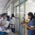 Thí sinh dự thi tại điểm thi Trường Đại học Sư phạm Kỹ thuật Thành phố Hồ Chí Minh. (Ảnh: Thu Hoài/TTXVN)