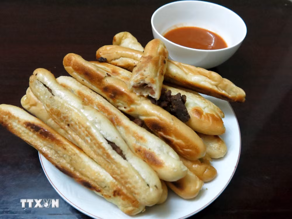 ttxvn-banh-mi-viet-nam-duoc-vinh-danh-ngon-nhat-the-gioi-7276526-3.jpg