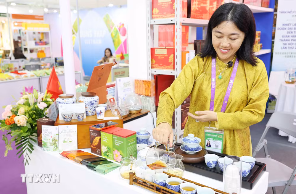 ttxvn-quang-ba-san-pham-chat-luong-cao-tai-thi-truong-trung-quoc-va-asean-9035509-2.jpg