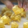 Chuyên gia dự báo kim loại quý này có thể dao động trong khoảng 2.900-3.100 USD/ounce vào cuối năm nay. (Nguồn: Yonhap/TTXVN)