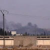 Khói bốc lên sau một cuộc không kích của lực lượng Mỹ nhằm vào tổ chức Hurras al-Din, một nhóm liên kết với mạng lưới khủng bố Al-Qaeda tại Syria. (Nguồn: THX/TTXVN)