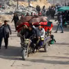 Người tị nạn Palestine trở về nhà ở thành phố Rafah ngày 19/1/2025. (Nguồn: THX/TTXVN)