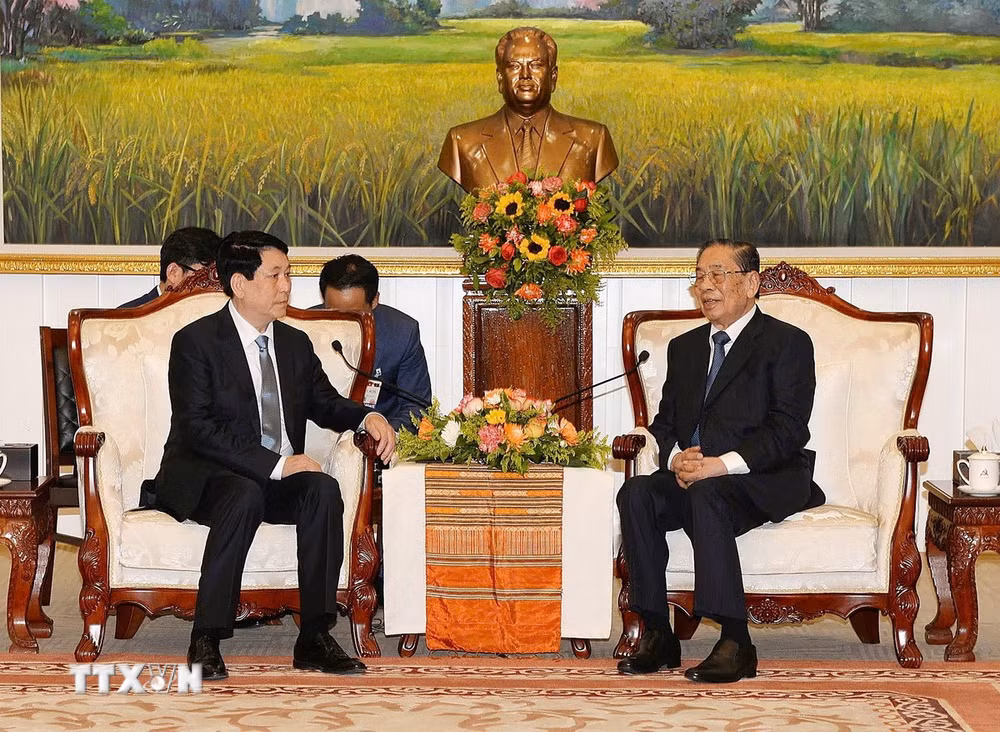 ttxvn-2504-chu-tich-nuoc-gap-nguyen-lanh-dao-lao-2.jpg