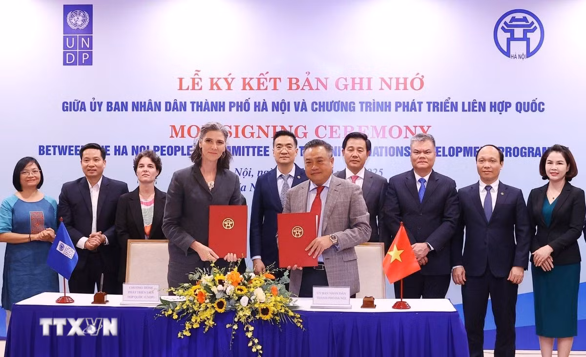 ttxvn-ha-noi-ky-ket-hop-tac-voiundp.jpg