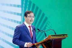 Tổng Biên tập Nguyễn Ngọc Thạch nhìn lại lịch sử 80 năm phát triển của Báo Nông nghiệp và Môi trường. (Ảnh: Tùng Đinh)