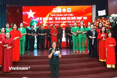 Chương trình văn nghệ tri ân những người đã ngã xuống. (Ảnh: Minh Thu/Vietnam+)