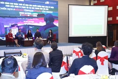 Các đại biểu tham gia phiên thảo luận tại sự kiện. (Ảnh: Thành Long)