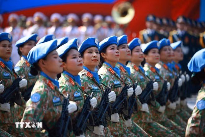 ttxvn-khoi-nu-gin-giu-hoa-binh-30.jpg