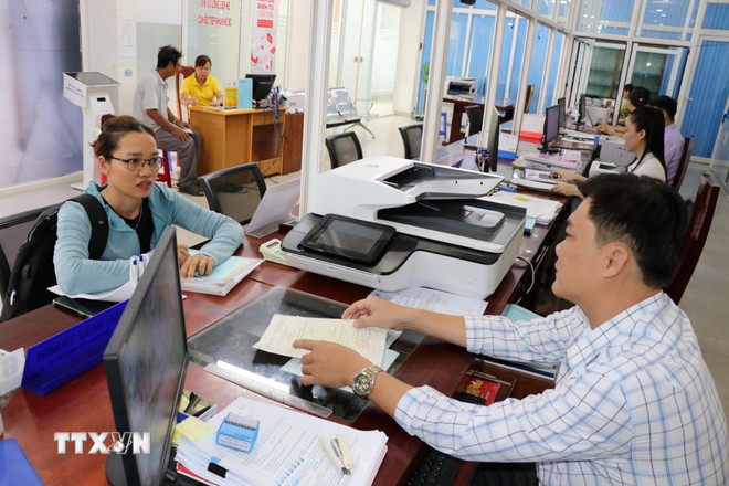 Sắp xếp lại giang sơn và sức mạnh đoàn kết: Thay đổi tư duy phân quyền cho cơ sở ttxvn-chinh-quyen-dia-phuong-hai-cap-0608-2.jpg