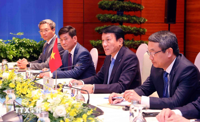 Seniorgeneralløytnant Luong Tam Quang, minister for offentlig sikkerhet, taler. (Foto: Pham Kien/VNA) ttxvn-bo-truong-cong-an-tiep-tong-giam-doc-dieu-hanh-cong-ty-kaspersky-cua-lien-bang-nga-3.jpg
