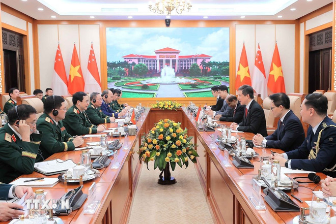 ttxvn-bo-truong-quoc-phong-singapore-tham-chinh-thuc-viet-nam-2207-2.jpg