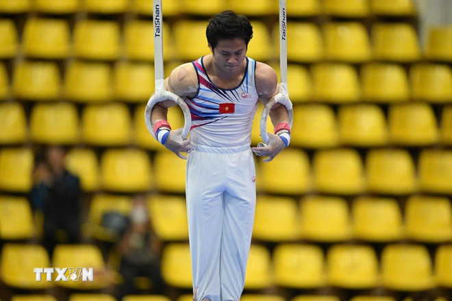 ttxvn-sea-games-33-khanh-phong-gianh-hcv-the-duc-dung-cu-noi-dung-vong-treo-1112.jpg