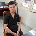Đối tượng Nguyễn Ngọc Đạo bị khởi về các tội “Giết người”, “Cướp tài sản” và “Tàng trữ, sử dụng trái phép vũ khí quân dụng”. (Ảnh: TTXVN phát)