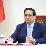 Thủ tướng Phạm Minh Chính điện đàm với Thủ tướng Kuwait Sheikh Ahmad Abdullah Al-Ahmad Al Sabah. (Ảnh: Dương Giang/TTXVN)