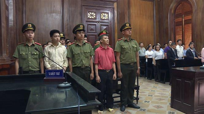 Các bị cáo tại phiên tòa. (Ảnh: TTXVN) Xét xử các thành viên tổ chức phản động 'Quốc nội quật khởi' ảnh 2