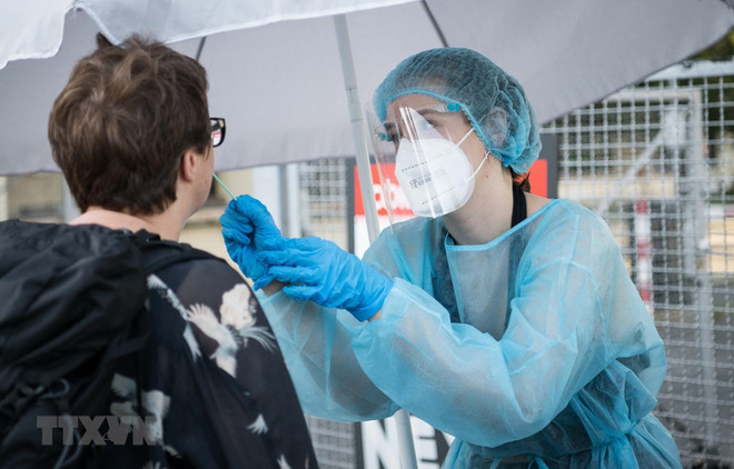 Đức trước yêu cầu thắt chặt các biện pháp phòng dịch COVID-19 ảnh 1